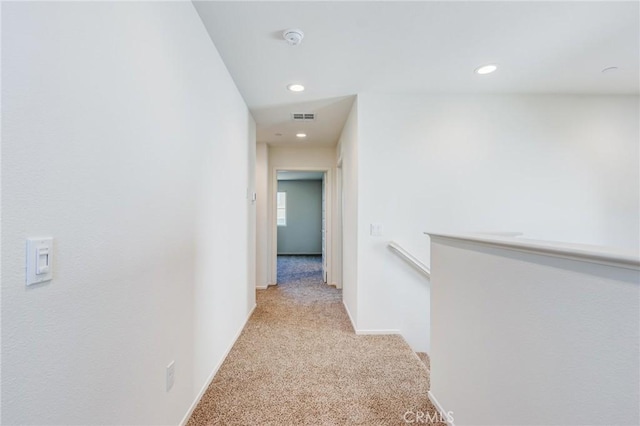 13119 Lancaster St, Hesperia, CA 92344 - hall with light carpet, recessed lighting, baseboards, and an upstairs landing