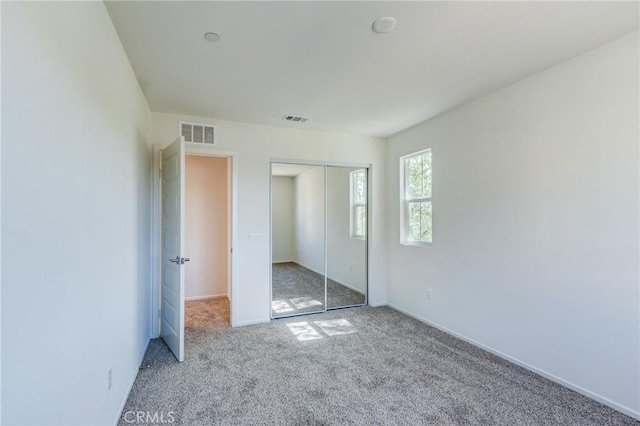 13119 Lancaster St, Hesperia, CA 92344 - unfurnished bedroom with carpet, a closet, and baseboards