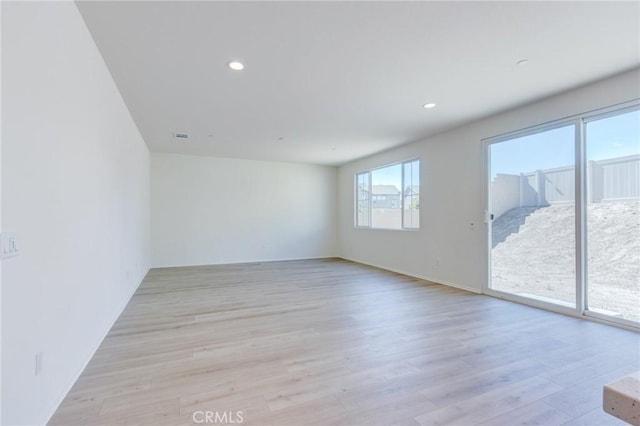 13119 Lancaster St, Hesperia, CA 92344 - unfurnished room with light wood-style flooring and recessed lighting