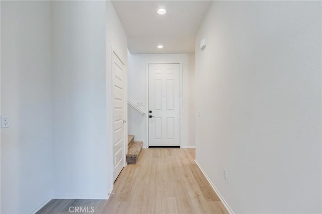 13119 Lancaster St, Hesperia, CA 92344 - corridor with recessed lighting, light wood-style flooring, baseboards, and stairs