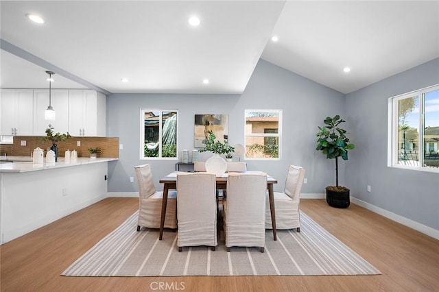 1223 W 90th St, Los Angeles, CA 90044 - dining room with light wood finished floors, recessed lighting, baseboards, and vaulted ceiling