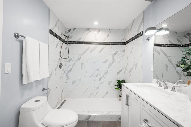 1223 W 90th St, Los Angeles, CA 90044 - bathroom with toilet, vanity, a marble finish shower, and recessed lighting