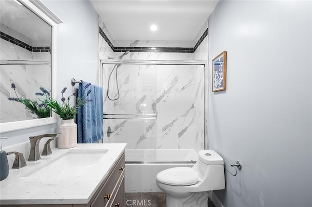 1223 W 90th St, Los Angeles, CA 90044 - bathroom featuring vanity, toilet, combined bath / shower with glass door, and recessed lighting