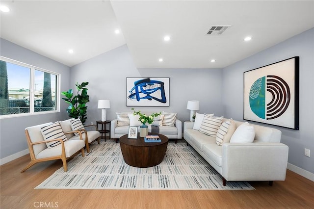 1223 W 90th St, Los Angeles, CA 90044 - living room with baseboards, wood finished floors, recessed lighting, and lofted ceiling