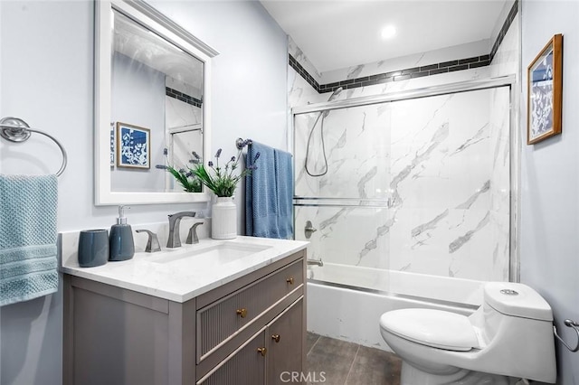 1223 W 90th St, Los Angeles, CA 90044 - full bathroom featuring toilet, vanity, and shower / bath combination with glass door