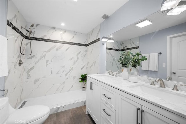 1223 W 90th St, Los Angeles, CA 90044 - bathroom with toilet, double vanity, a marble finish shower, and recessed lighting