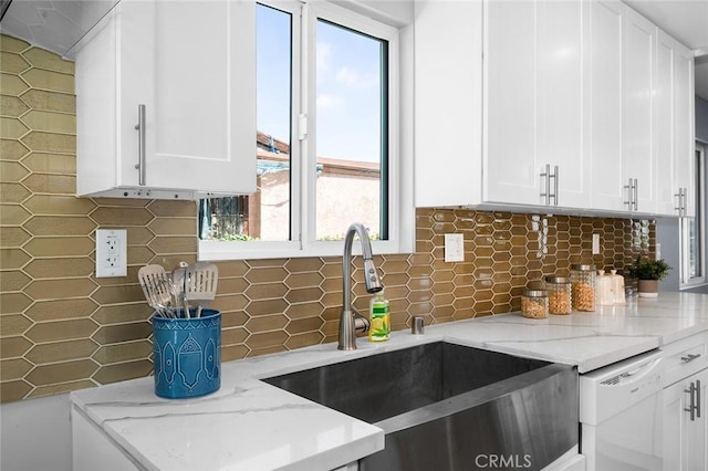 1223 W 90th St, Los Angeles, CA 90044 - kitchen featuring a sink, white dishwasher, backsplash, and white cabinetry