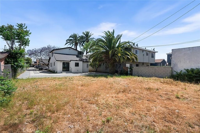 1223 W 90th St, Los Angeles, CA 90044 - back of property featuring a patio area