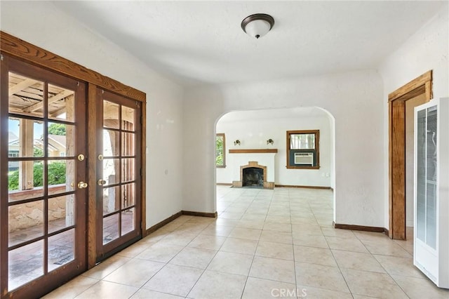 541 Randolph St, Pomona, CA 91768 - corridor with a heating unit, arched walkways, french doors, light tile patterned floors, and cooling unit