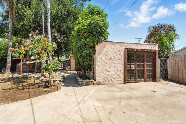 541 Randolph St, Pomona, CA 91768 - view of front of house with a patio, a gate, and stucco siding