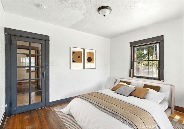 541 Randolph St, Pomona, CA 91768 - bedroom featuring wood-type flooring and a textured ceiling