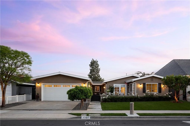 1307 Oxford Ln, Newport Beach, CA 92660 - ranch-style home featuring stucco siding, a garage, and driveway