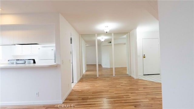 14610 Erwin St, Van Nuys, CA 91411 - corridor featuring wood finished floors