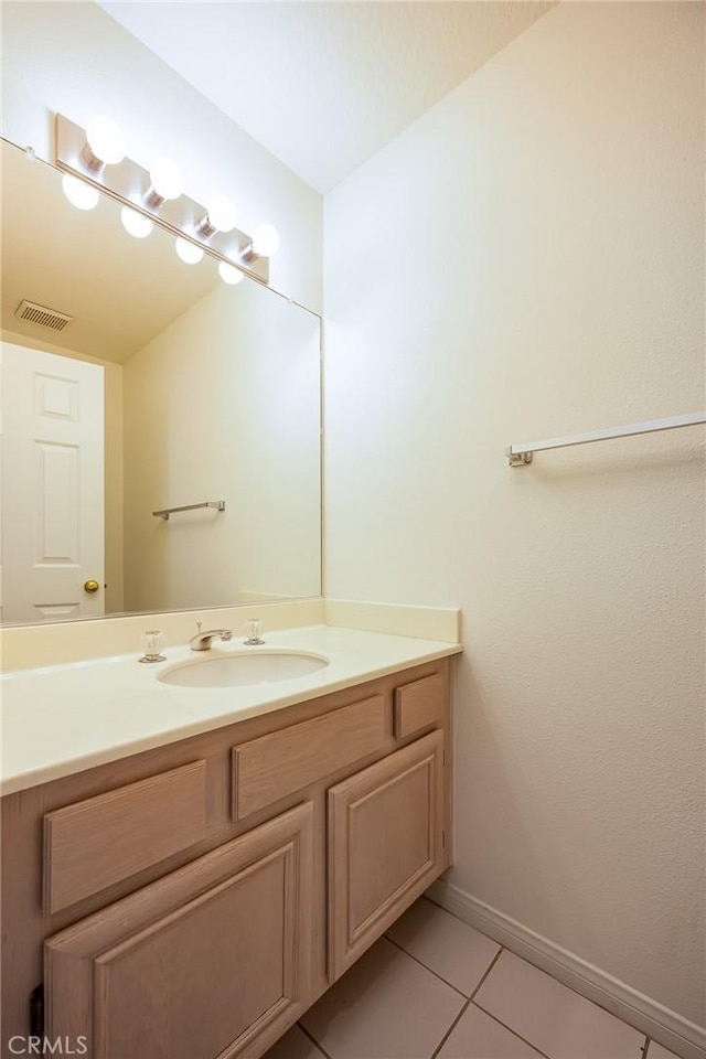 24177 Morning Dove Ln, Murrieta, CA 92562 - bathroom featuring vanity, tile patterned floors, and baseboards