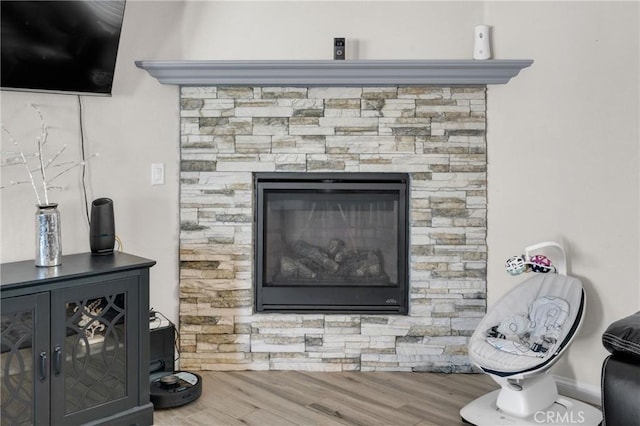 21044 Wisteria St, Apple Valley, CA 92308 - detailed view of wood finished floors and a stone fireplace
