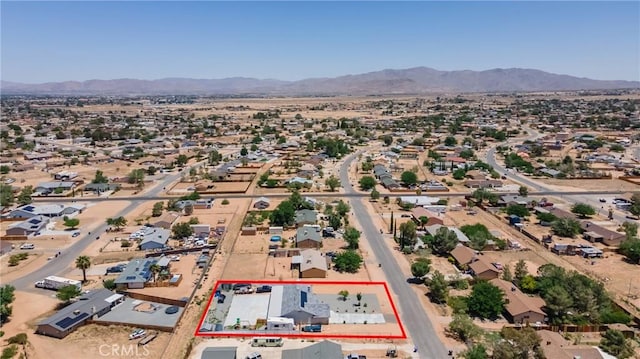 21044 Wisteria St, Apple Valley, CA 92308 - aerial overview of property's location featuring property parcel outlined and a mountain backdrop