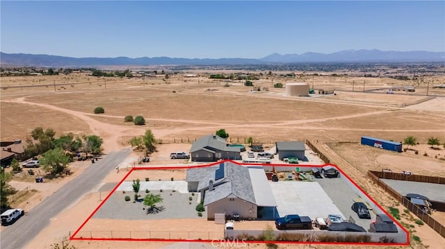 21044 Wisteria St, Apple Valley, CA 92308 - overview of rural landscape with property parcel outlined, a desert landscape, and mountains