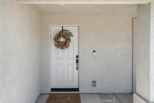 21044 Wisteria St, Apple Valley, CA 92308 - view of exterior entry with stucco siding