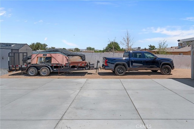 21044 Wisteria St, Apple Valley, CA 92308 - view of vehicle parking featuring a shed