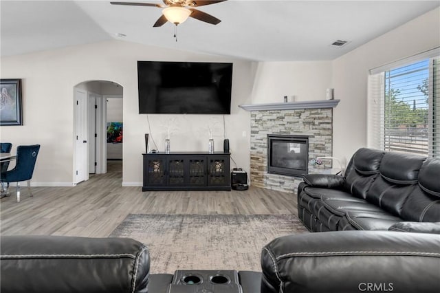 21044 Wisteria St, Apple Valley, CA 92308 - living area with ceiling fan, arched walkways, lofted ceiling, wood finished floors, and baseboards