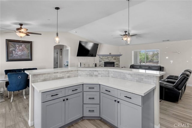 21044 Wisteria St, Apple Valley, CA 92308 - kitchen featuring open floor plan, ceiling fan, gray cabinets, and vaulted ceiling