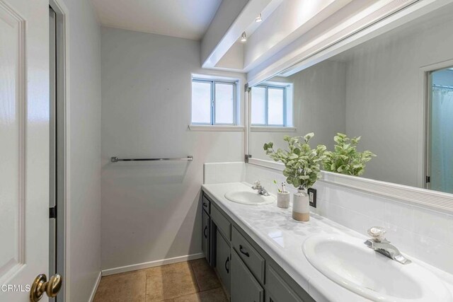 14000 Castlemaine Ave, Bakersfield, CA 93314 - full bathroom with double vanity and tile patterned floors
