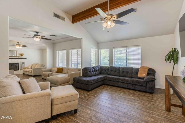 14000 Castlemaine Ave, Bakersfield, CA 93314 - living area with a ceiling fan, dark wood-style floors, and a glass covered fireplace