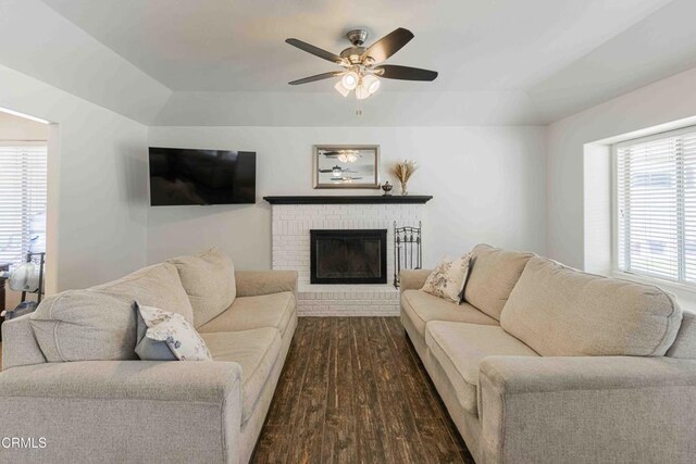 14000 Castlemaine Ave, Bakersfield, CA 93314 - living room featuring vaulted ceiling, ceiling fan, dark wood-style flooring, and a fireplace