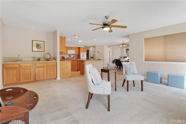 19410 Allegheny Ct, Apple Valley, CA 92307 - living area with light carpet, ceiling fan, baseboards, and recessed lighting