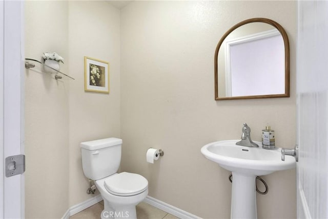 19410 Allegheny Ct, Apple Valley, CA 92307 - bathroom with toilet, baseboards, and tile patterned floors