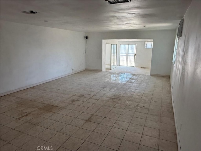 4639 Flora St, Montclair, CA 91763 - spare room featuring baseboards