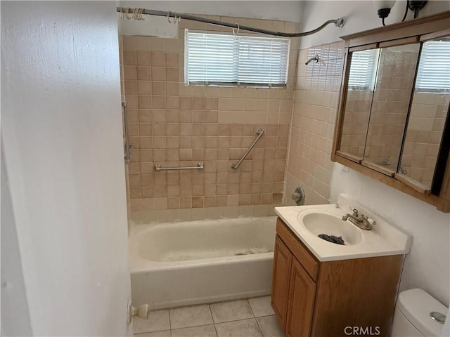 4639 Flora St, Montclair, CA 91763 - bathroom with vanity, toilet, tile patterned floors, and shower / bath combination