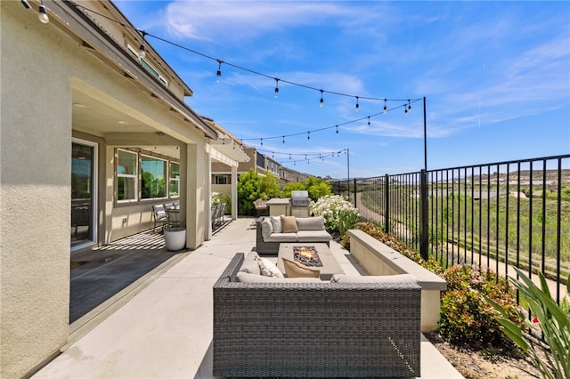32325 Hillstone St, Temecula, CA 92591 - view of patio with an outdoor living space with a fire pit