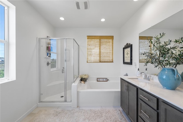 32325 Hillstone St, Temecula, CA 92591 - full bathroom with a garden tub, vanity, a stall shower, tile patterned flooring, and recessed lighting