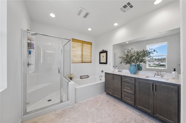 32325 Hillstone St, Temecula, CA 92591 - bathroom with a stall shower, a garden tub, recessed lighting, double vanity, and tile patterned floors
