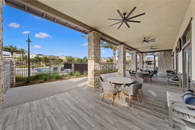 32325 Hillstone St, Temecula, CA 92591 - wooden terrace with outdoor dining area and a ceiling fan