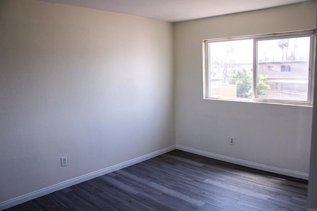 188 S Lincoln Ave Unit 22, El Cajon, CA 92020 - unfurnished room featuring dark wood finished floors and baseboards
