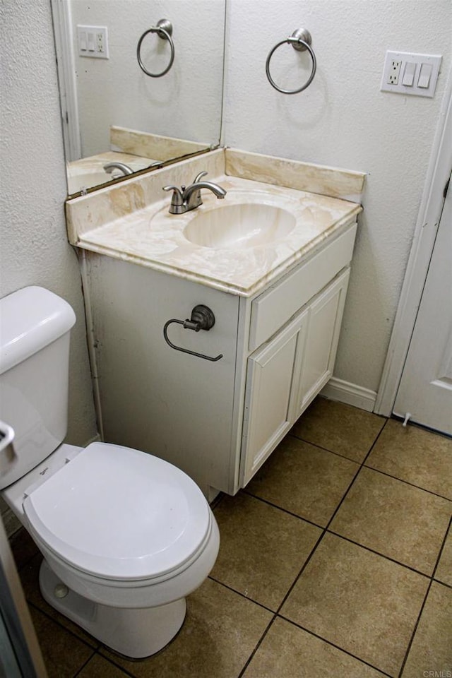 188 S Lincoln Ave Unit 22, El Cajon, CA 92020 - bathroom with vanity, toilet, and tile patterned floors
