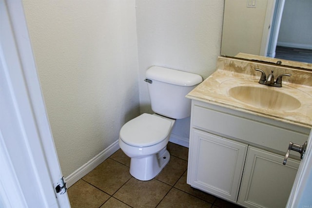 188 S Lincoln Ave Unit 22, El Cajon, CA 92020 - half bathroom with toilet, vanity, tile patterned floors, and baseboards
