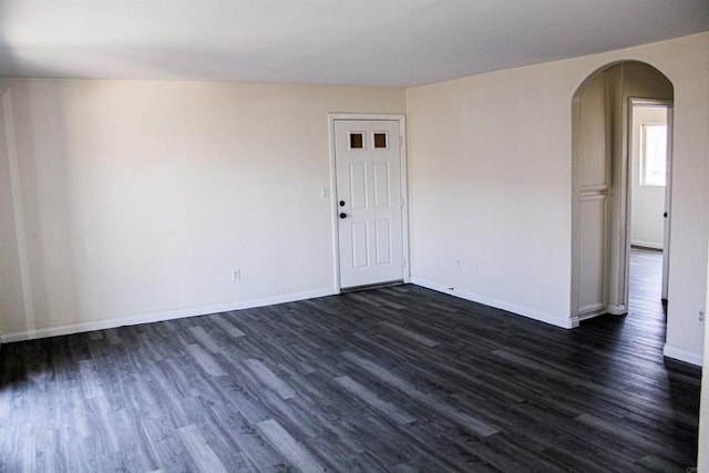 188 S Lincoln Ave Unit 22, El Cajon, CA 92020 - empty room with arched walkways, dark wood-type flooring, and baseboards