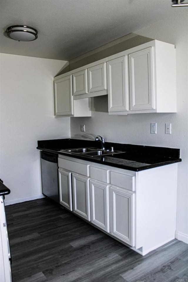 188 S Lincoln Ave Unit 22, El Cajon, CA 92020 - kitchen with a sink, stainless steel dishwasher, baseboards, dark wood-style floors, and dark countertops