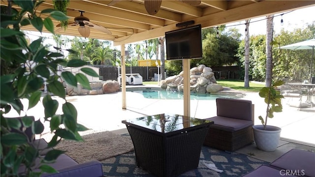 6003 Bluewater Bay Ct, Bakersfield, CA 93312 - fenced backyard with ceiling fan and a patio
