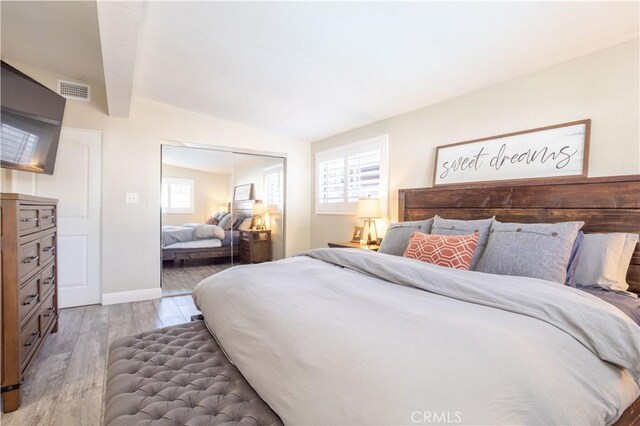 27573 Santa Clarita Rd, Saugus, CA 91350 - bedroom with wood finished floors, baseboards, and a closet