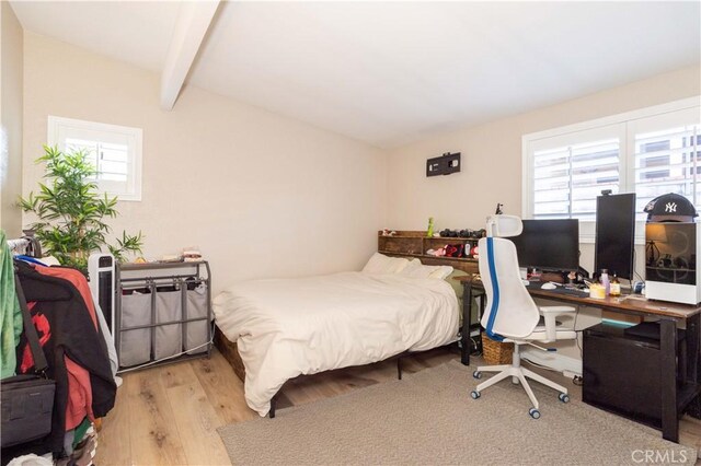 27573 Santa Clarita Rd, Saugus, CA 91350 - bedroom featuring multiple windows, wood finished floors, and an office area