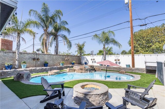 27573 Santa Clarita Rd, Saugus, CA 91350 - view of pool with an outdoor fire pit and a patio area