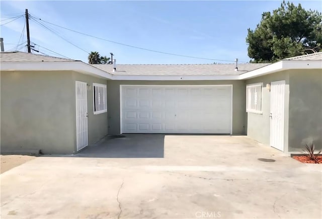 352 W Peach St, Compton, CA 90222 - garage featuring concrete driveway