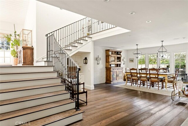 326 Ruby St, Laguna Beach, CA 92651 - staircase featuring wood finished floors, recessed lighting, and baseboards