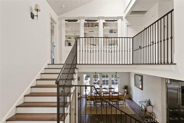 326 Ruby St, Laguna Beach, CA 92651 - stairway featuring high vaulted ceiling, french doors, and wood finished floors