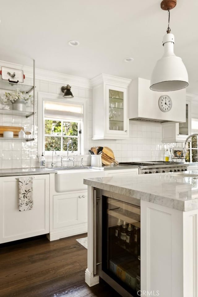 326 Ruby St, Laguna Beach, CA 92651 - kitchen featuring wine cooler, tasteful backsplash, white cabinetry, dark wood-style flooring, and a sink