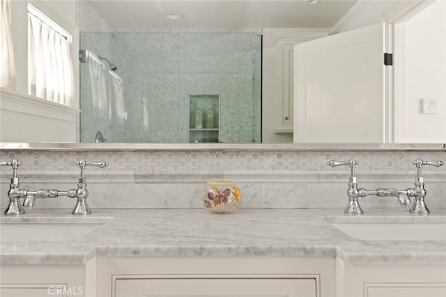 326 Ruby St, Laguna Beach, CA 92651 - full bath featuring double vanity, decorative backsplash, and a shower with door